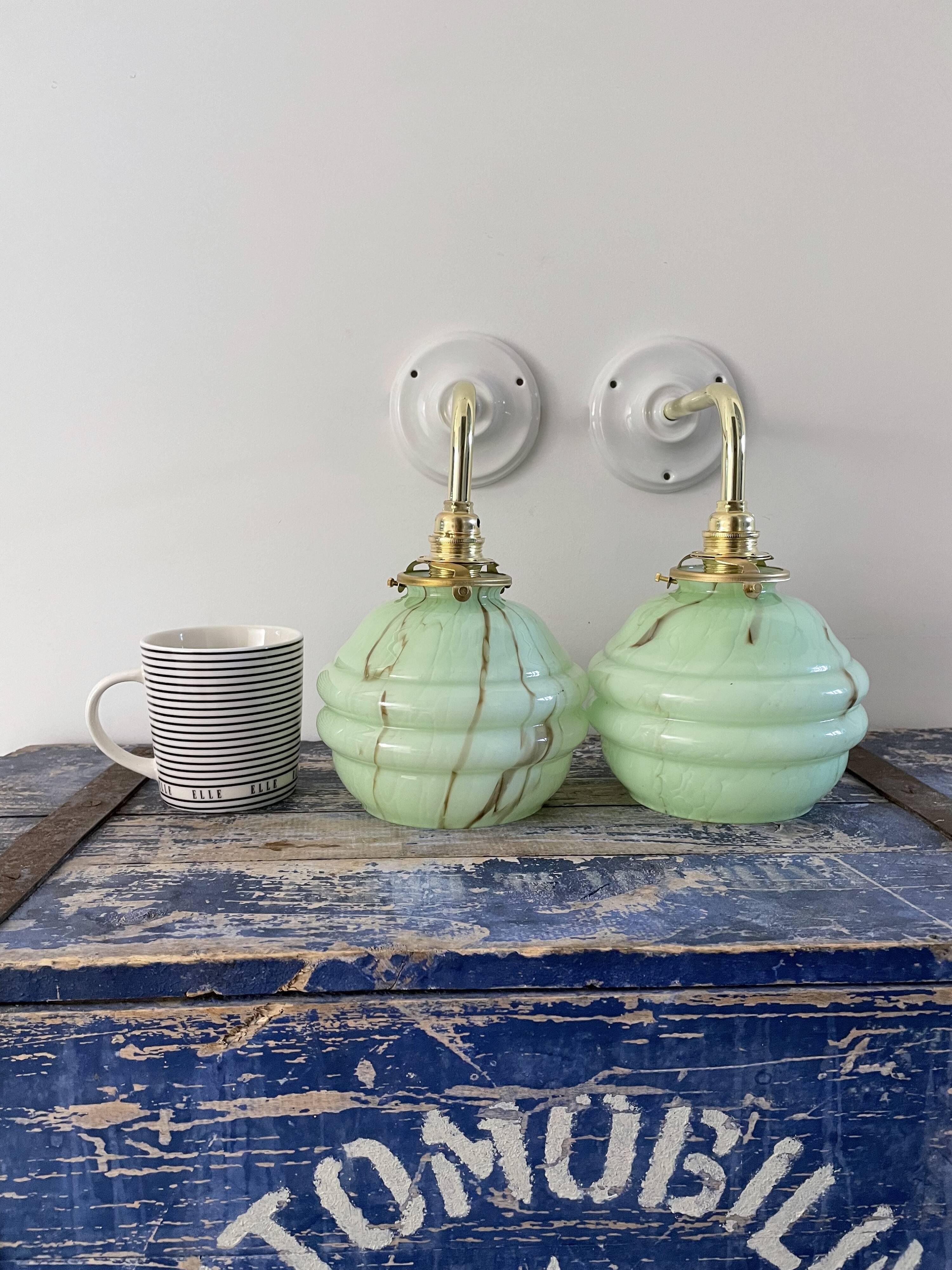 Pair of new electrified mint Art Deco sconces