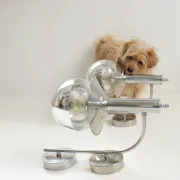 Pair of European mid-century chrome wall sconces with mirrored globe shades