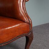 Old armchair in sheep leather