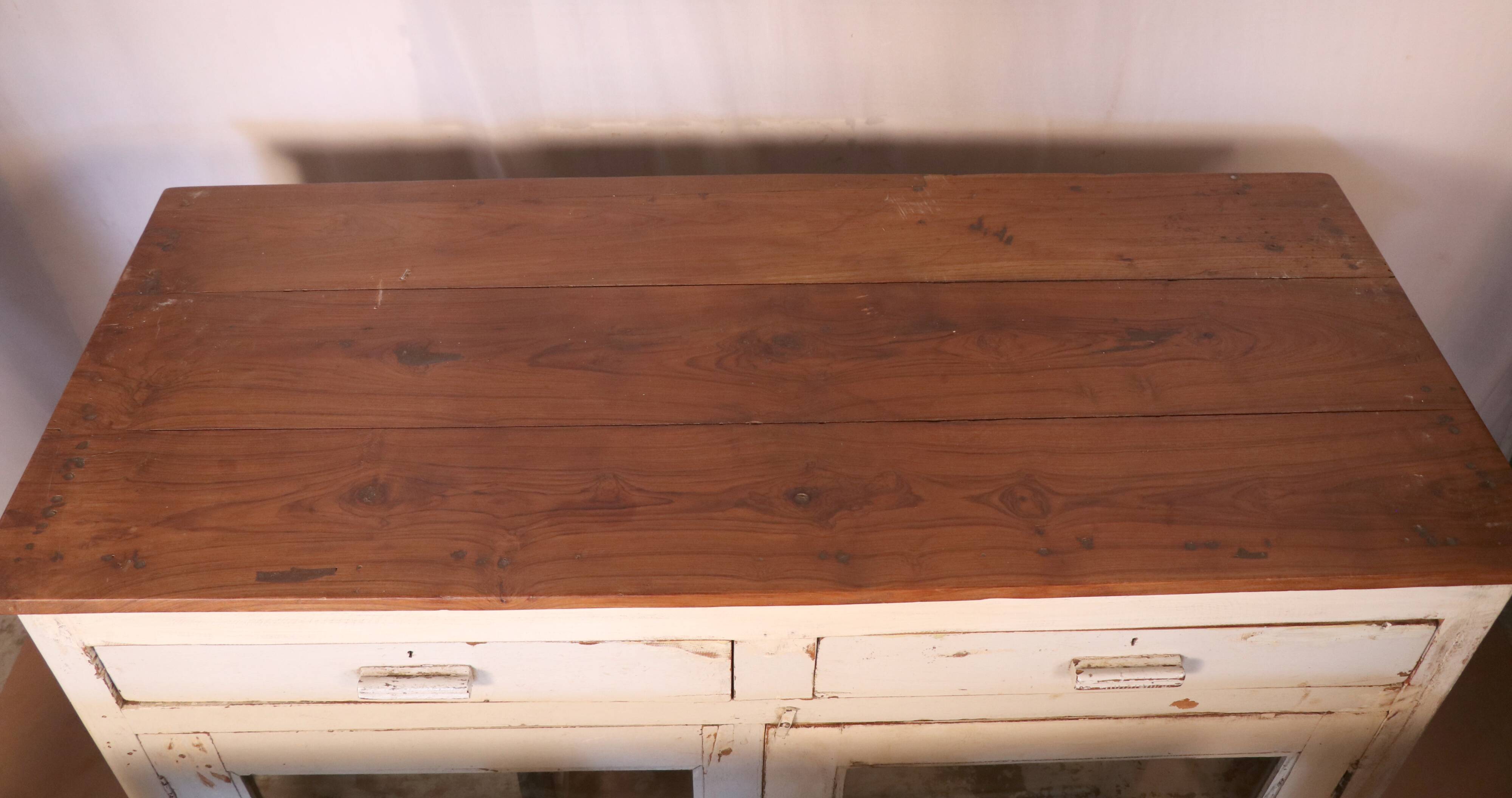 Merchant counter in Burmese teak with original white patina