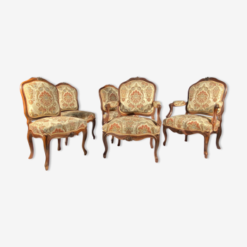 Salon de style Louis XV comprenant une paire de fauteuils et trois chaises