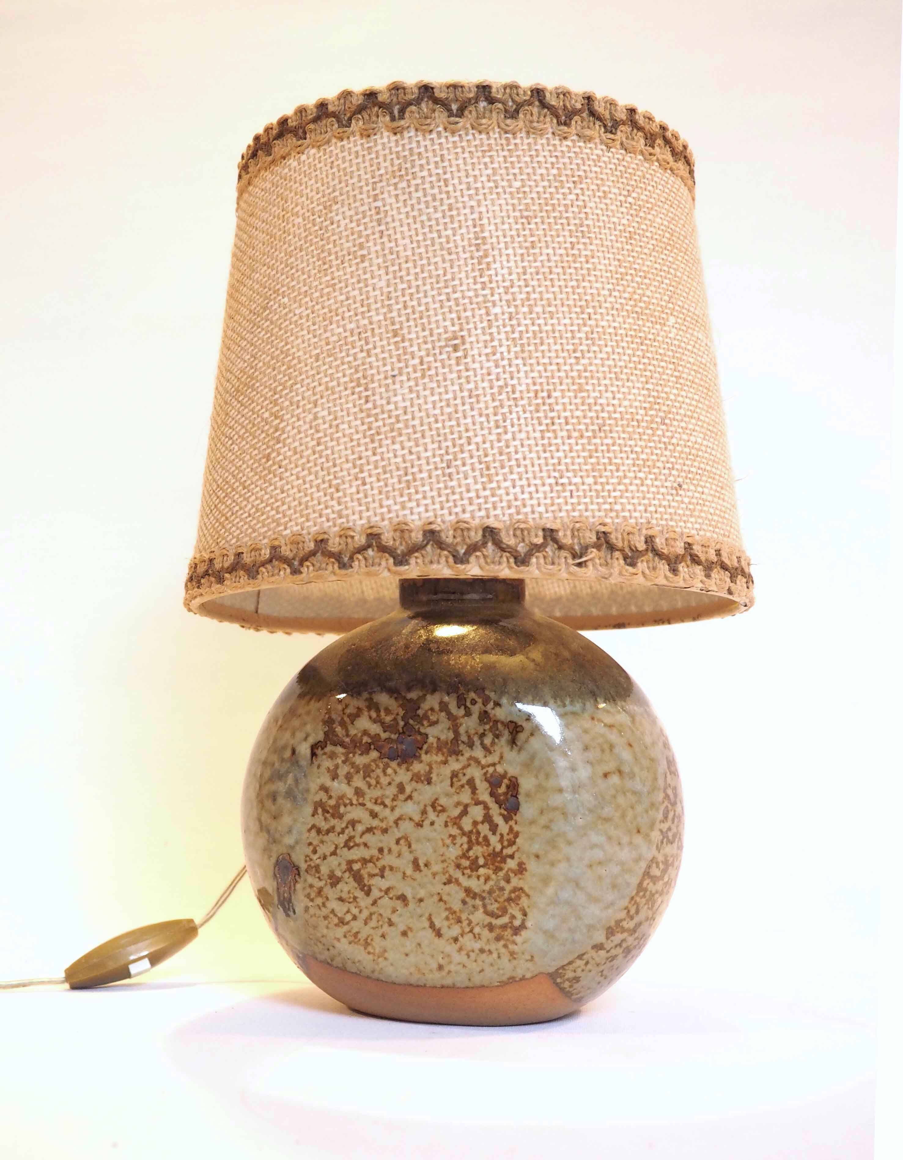 Flattened ball ceramic lamp