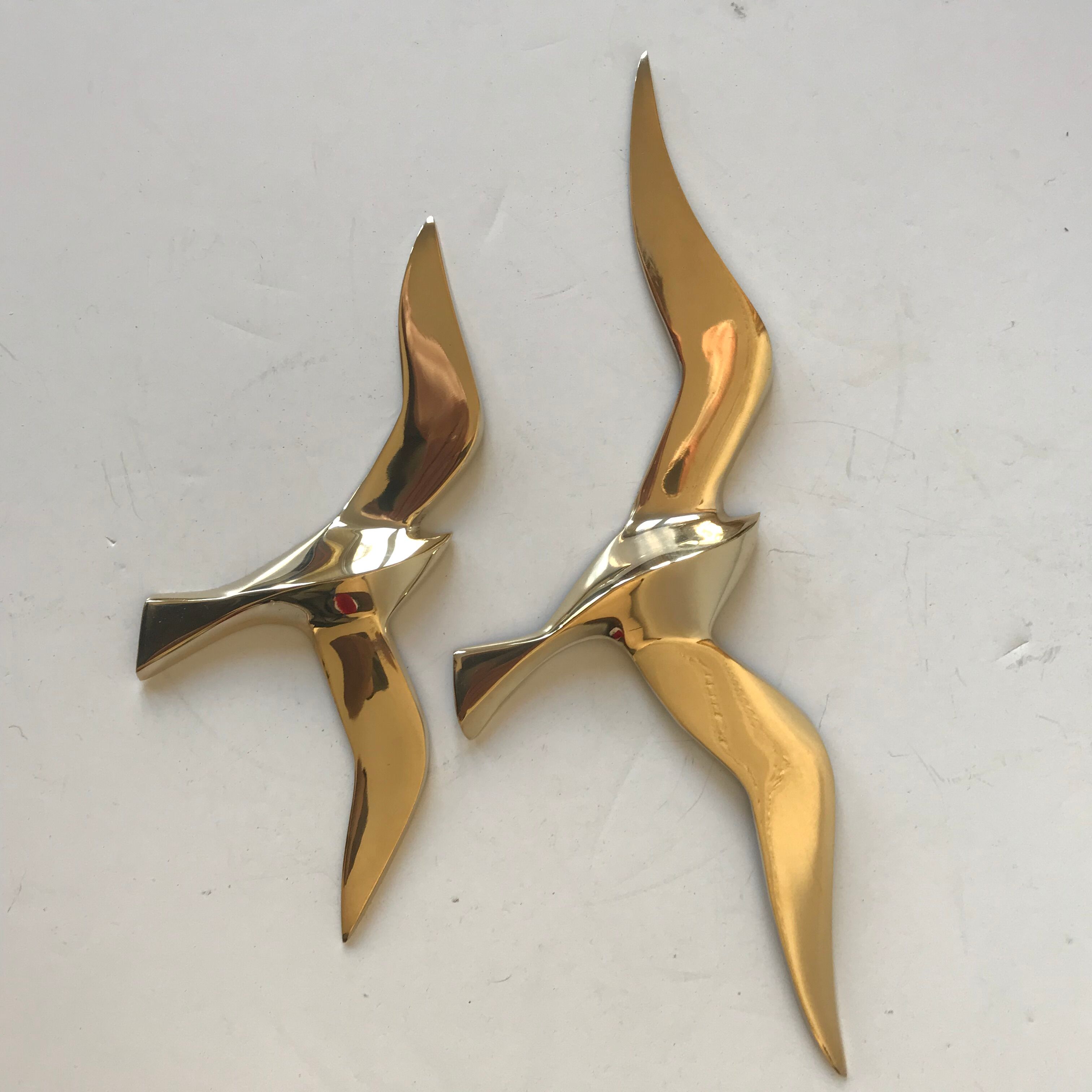 Pair of brass birds
