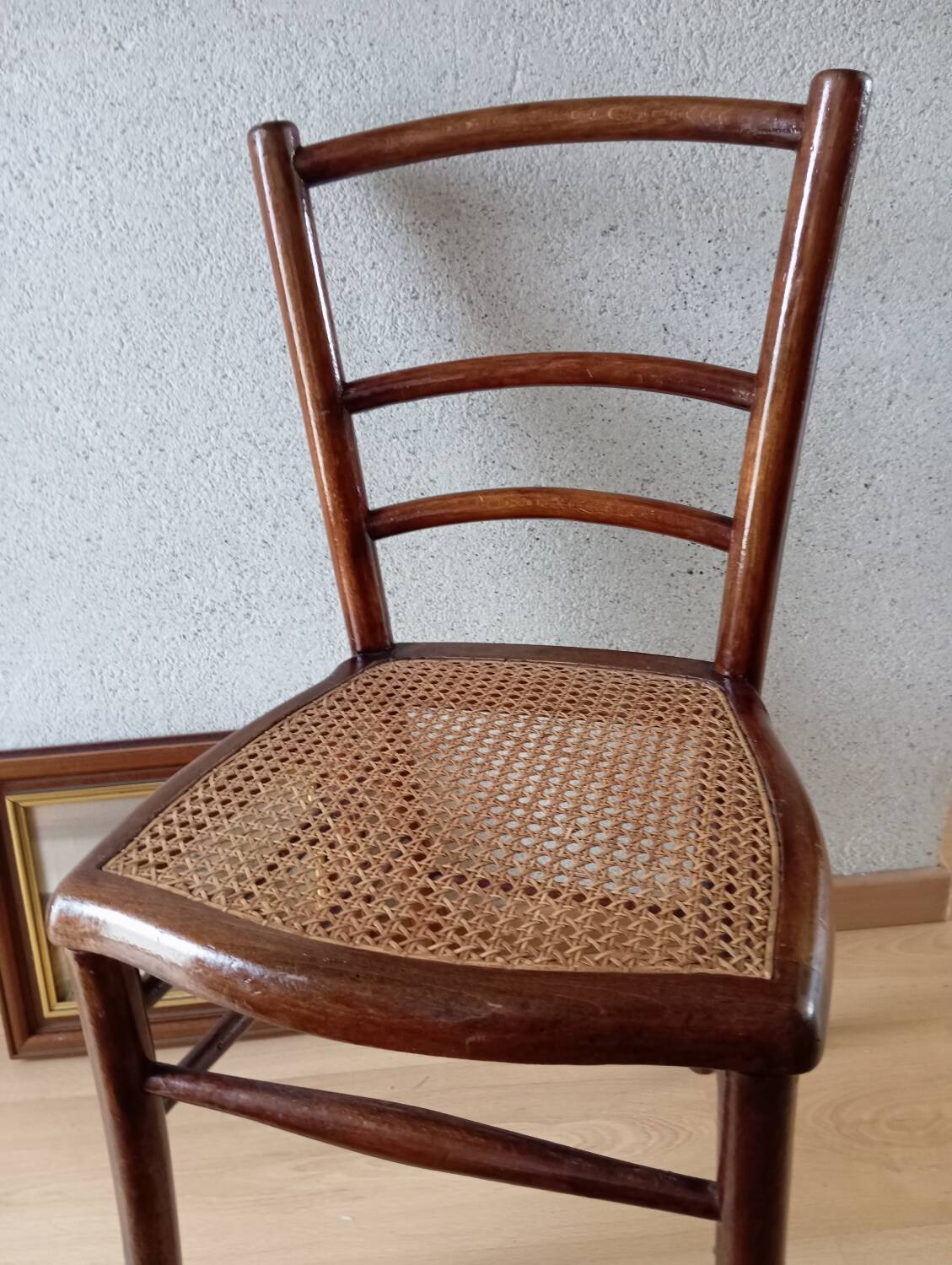 Wooden chair with cane seat, country style, around 1920