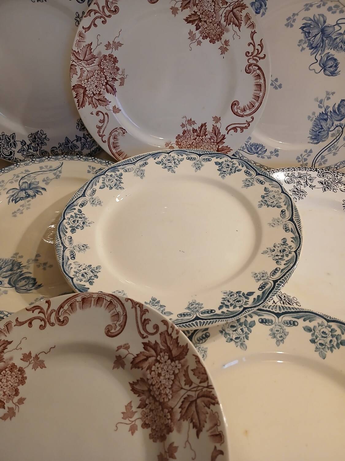 8 mismatched ironstone dinner plates