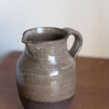 Signed sandstone pitcher