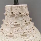 Ceramic hanging lamp in creamy white color that almost looks like a corral
