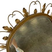 Vintage gold wall mirror with leaves