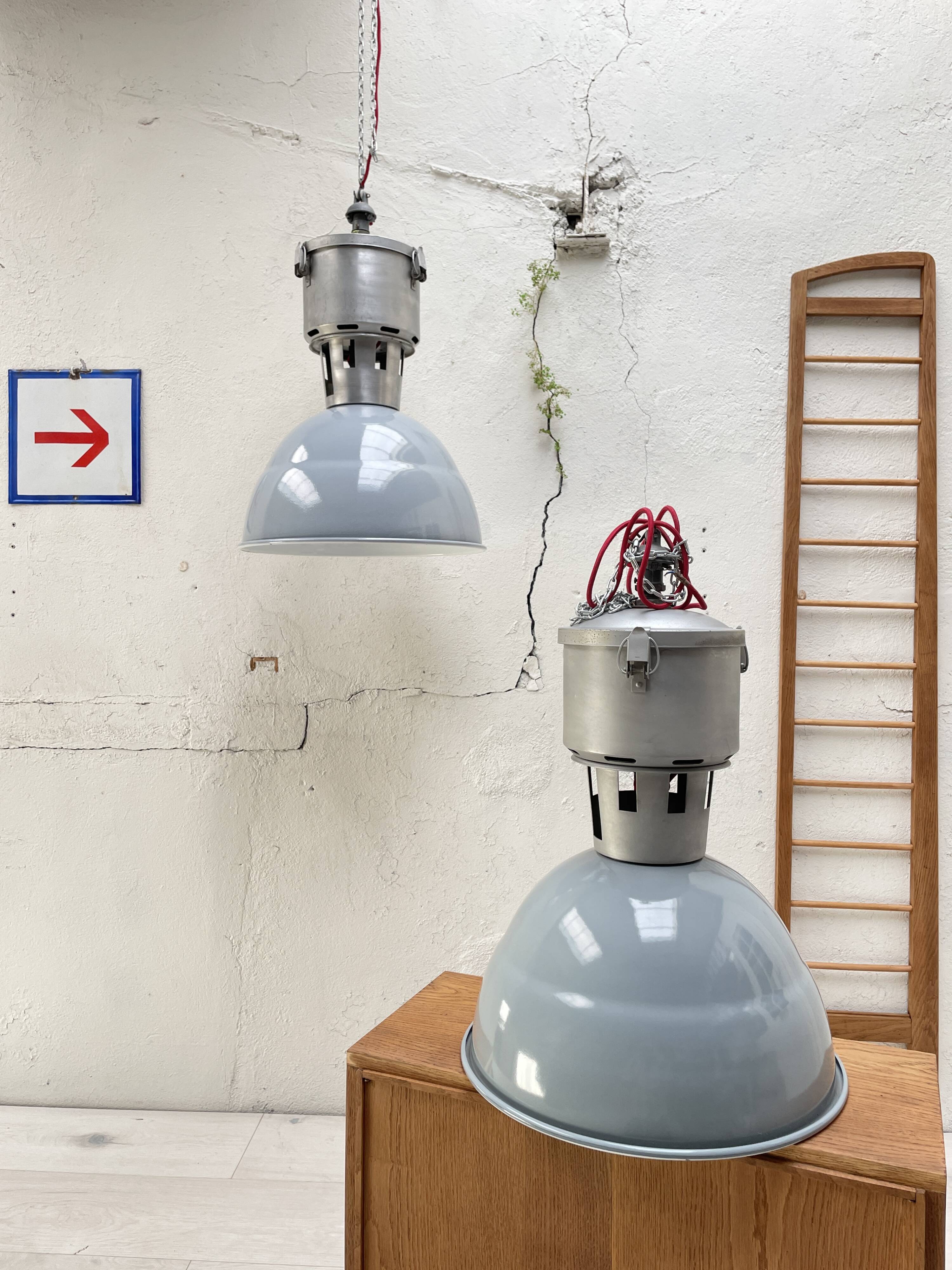 Pair of industrial lamps.