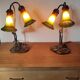 Deux lampes nénuphar en laiton et verre