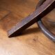Baumann swivel parrot coat rack, dark wood.
