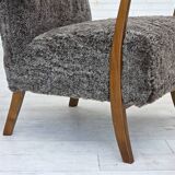 1960s, reupholstered Danish armchair, with stool, genuine sheepskin.