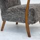 1960s, reupholstered Danish armchair, with stool, genuine sheepskin.