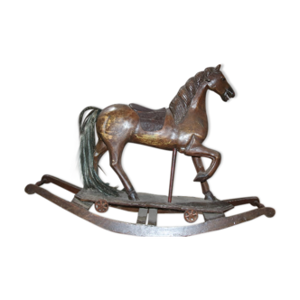 Old polychrome wooden rocking horse