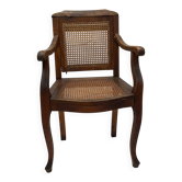 Caned armchair