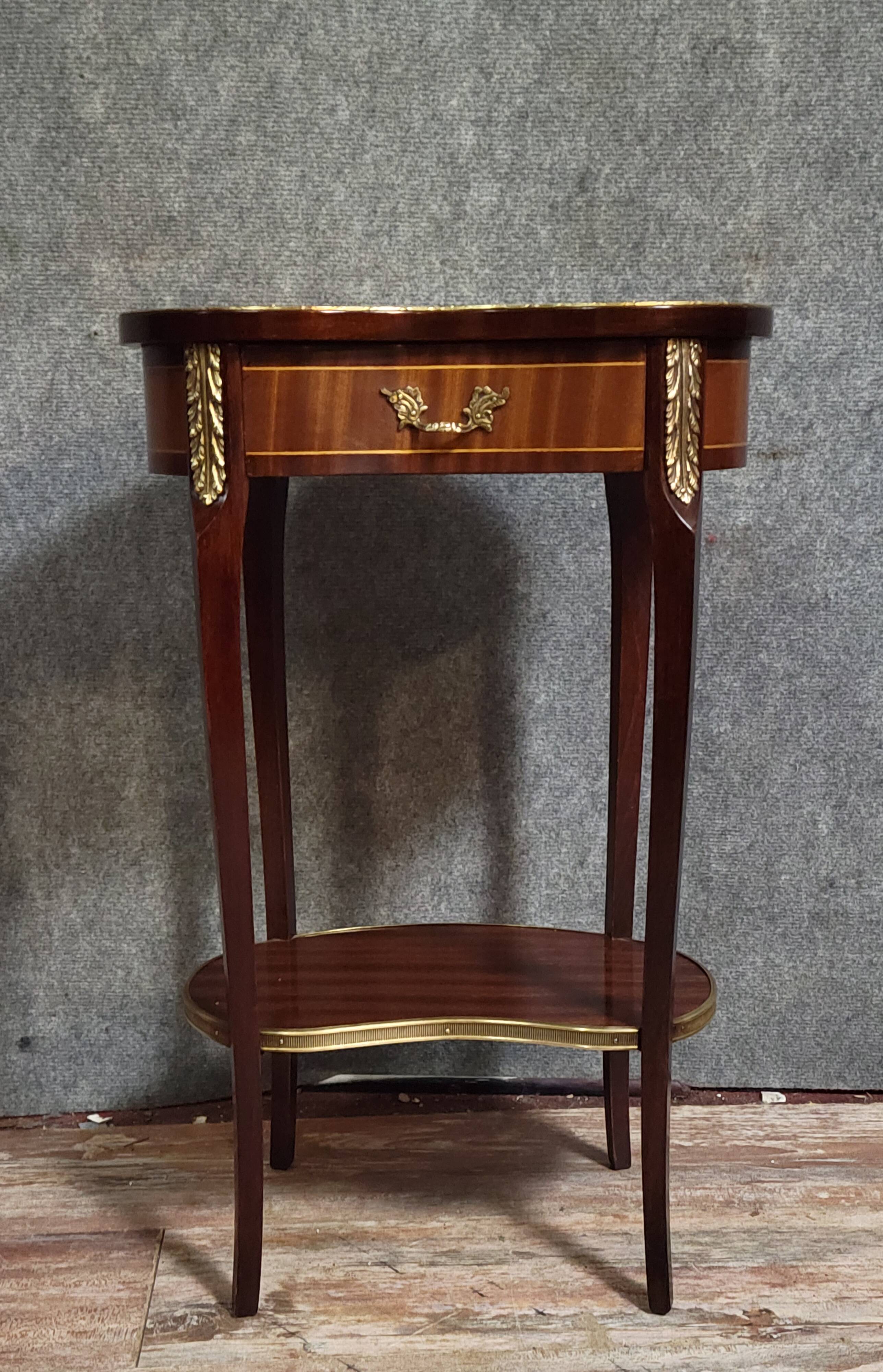 Louis XV style side table, in marquetry.