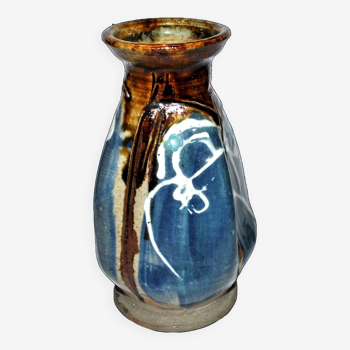 Old ceramic vase signed