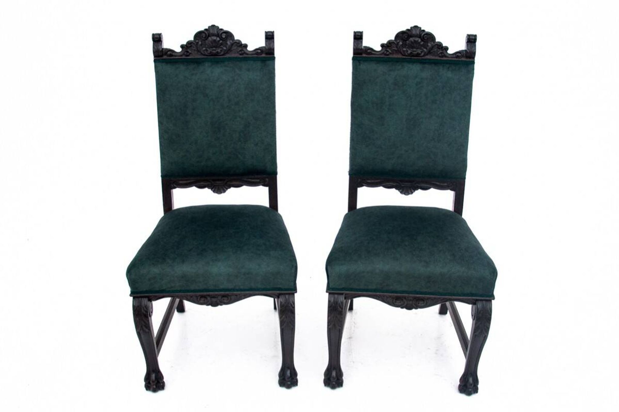A pair of antique chairs on lion's paws, Western Europe, circa 1920.