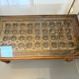 Solid oak carved coffee table with glass top