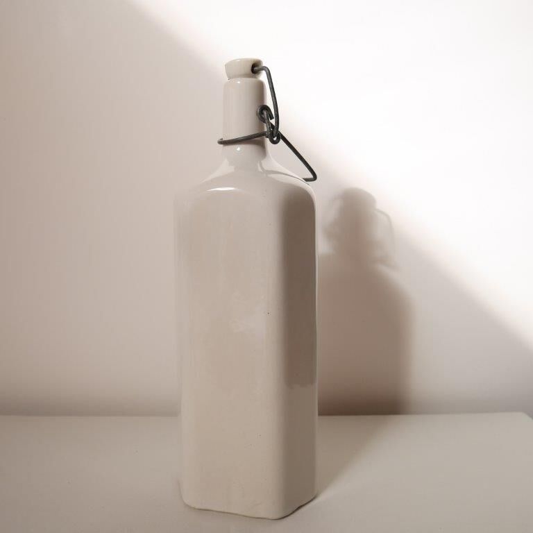 Old stoneware hot water bottle or bottle