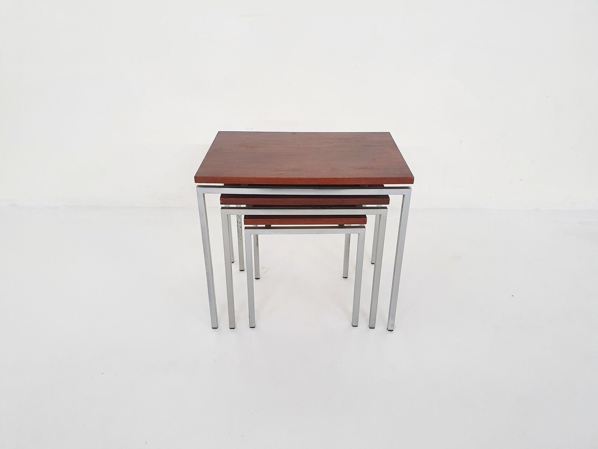 Rosewood and metal nesting tables, The Netherlands 1960's