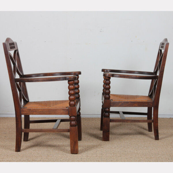 Pair of armchairs in the style of Charles Dudouyt, 1950.