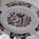Large oval white ceramic platter, decorated with peacocks and vintage flowers