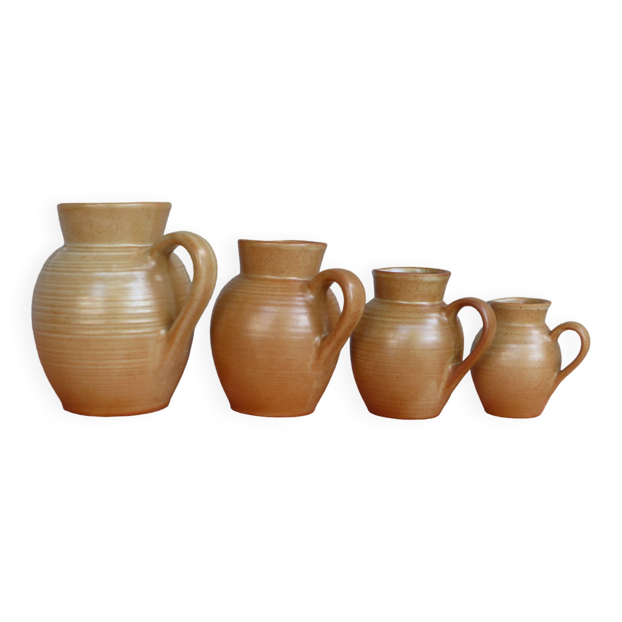 Set of 4 pitchers, CNP, Grès Village France.