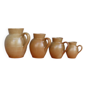 Set of 4 pitchers, CNP, Grès Village France.