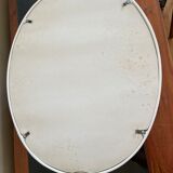 Oval mirror in white lacquered metal