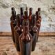 Set of 10 bottles of old Bordeaux French wine in ruby brown glass, 19th century.