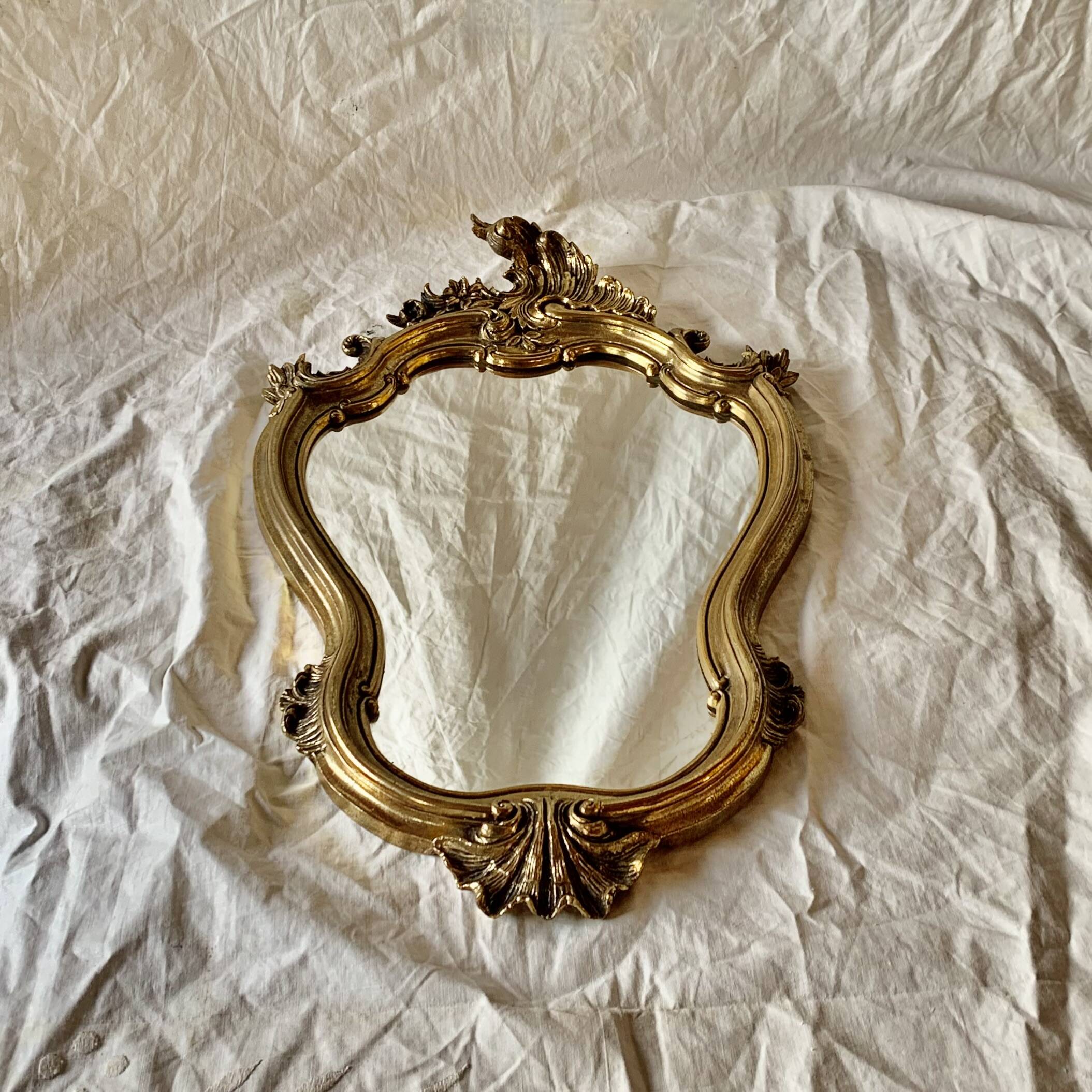 Old wall mirror in golden resin rococo style - made in france
