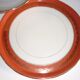 Plate and limoges porcelain dish with orange and gold trim