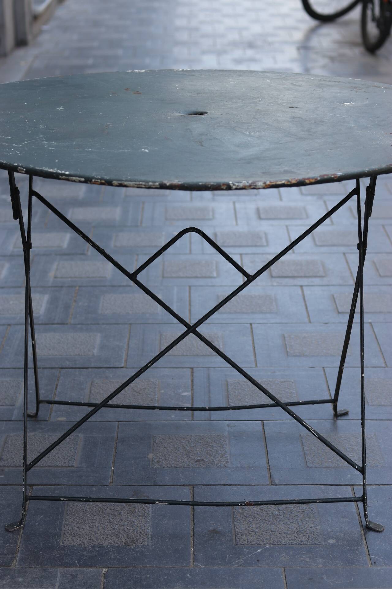 Folding wrought iron garden table