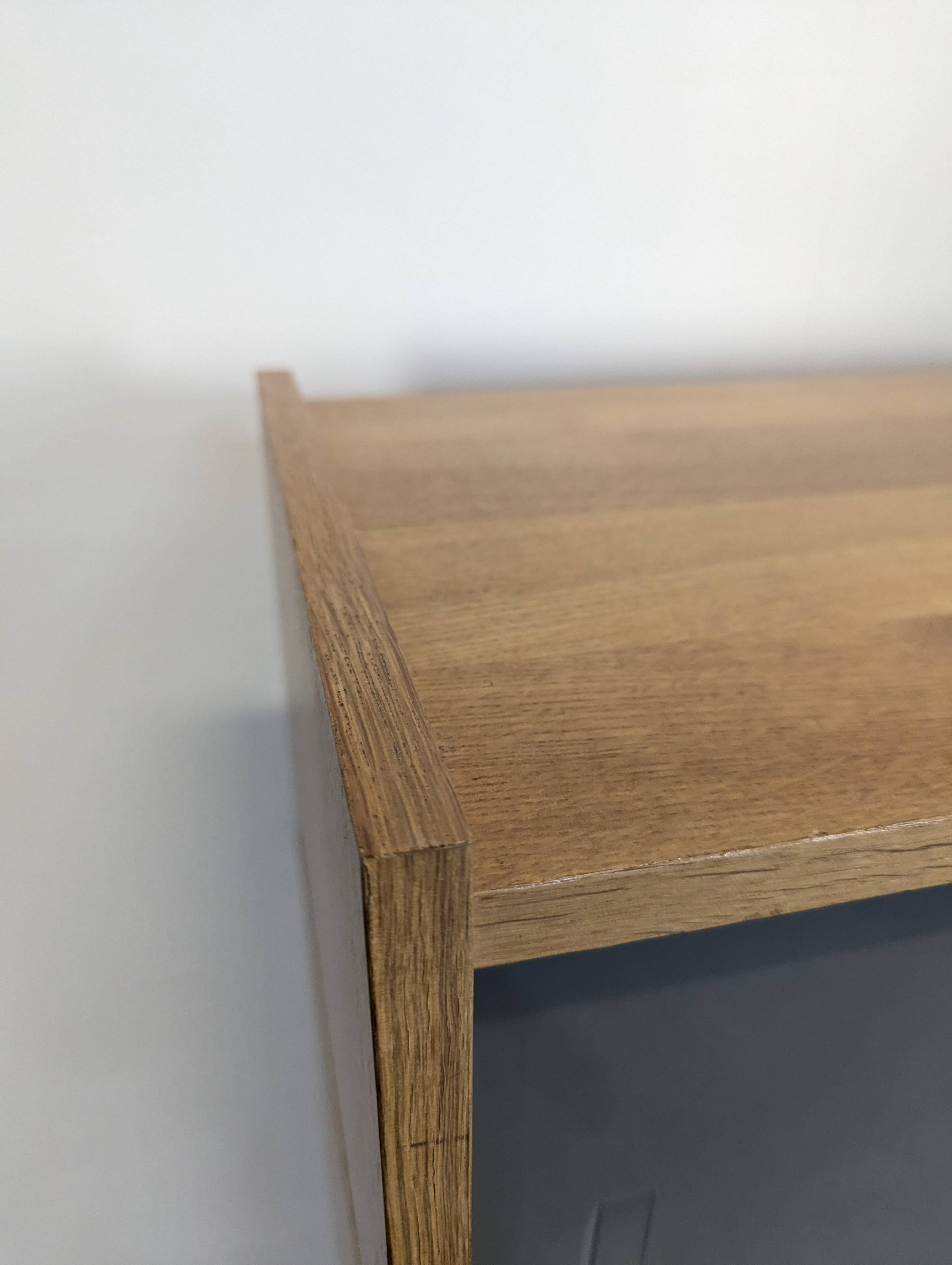 Modernist sideboard with glass doors in grey and yellow oak veneer.