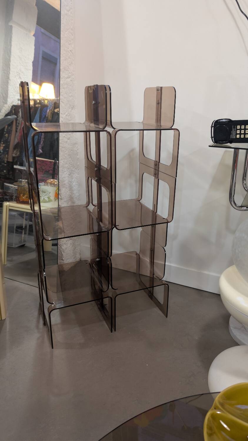 Smoked plexiglass bookshelf