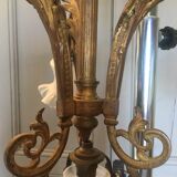 Old brass chandelier with tulips