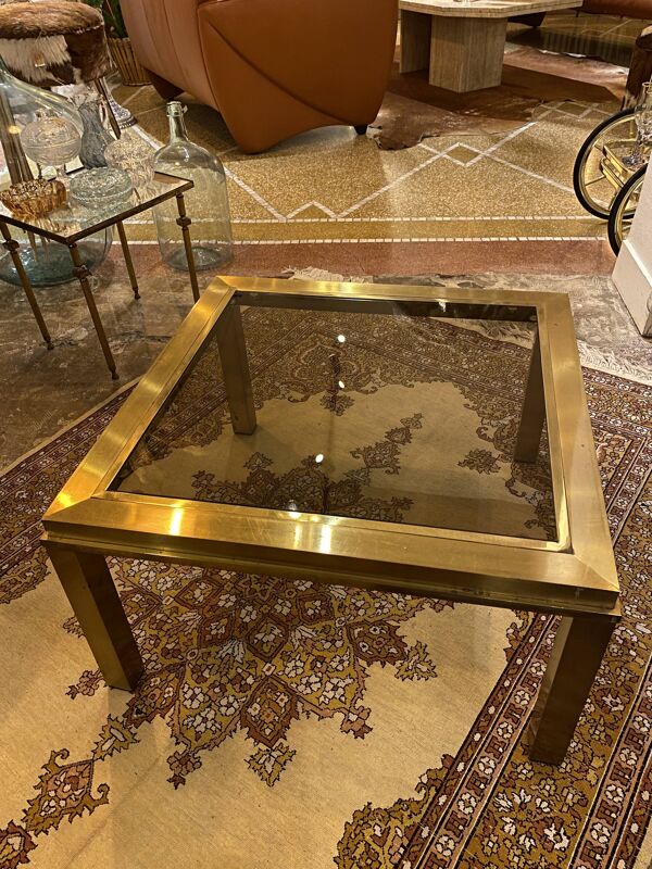 Table basse carrée dorée et verre fumé