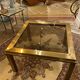 Gold square coffee table and smoked glass