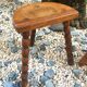 2 vintage tripod stools