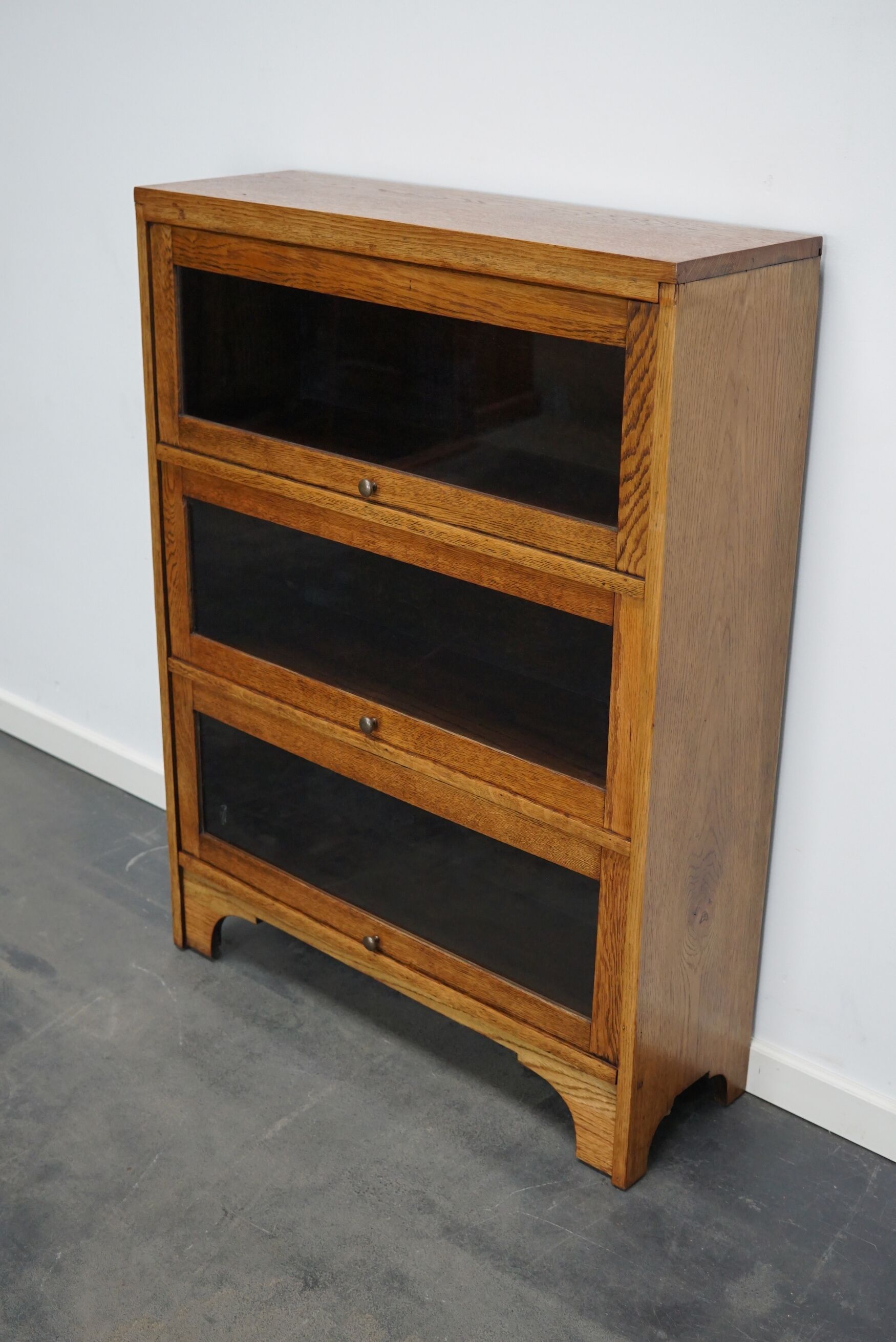 German Oak Bookcase with Folding Doors In Style of Globe Wernicke, ca 1930s