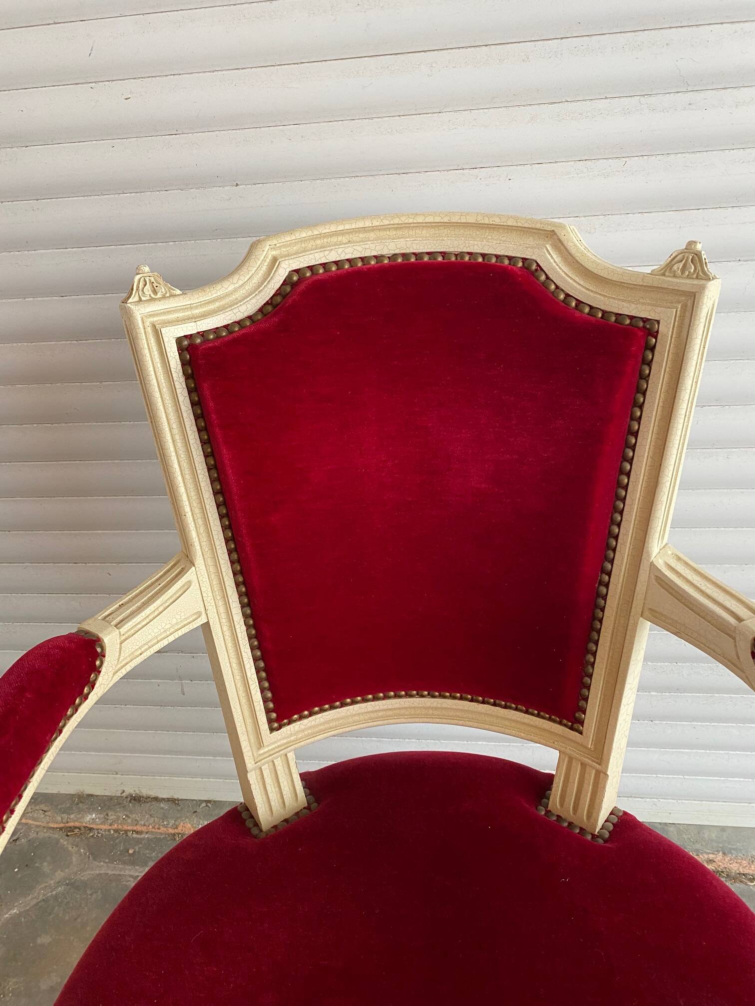 PAIR OF LOUIS XVI STYLE CABRIOLET ARMCHAIRS IN STUDDED RED VELVET FABRIC