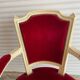 PAIR OF LOUIS XVI STYLE CABRIOLET ARMCHAIRS IN STUDDED RED VELVET FABRIC