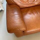 Fauteuil chauffeuse cuir années 80