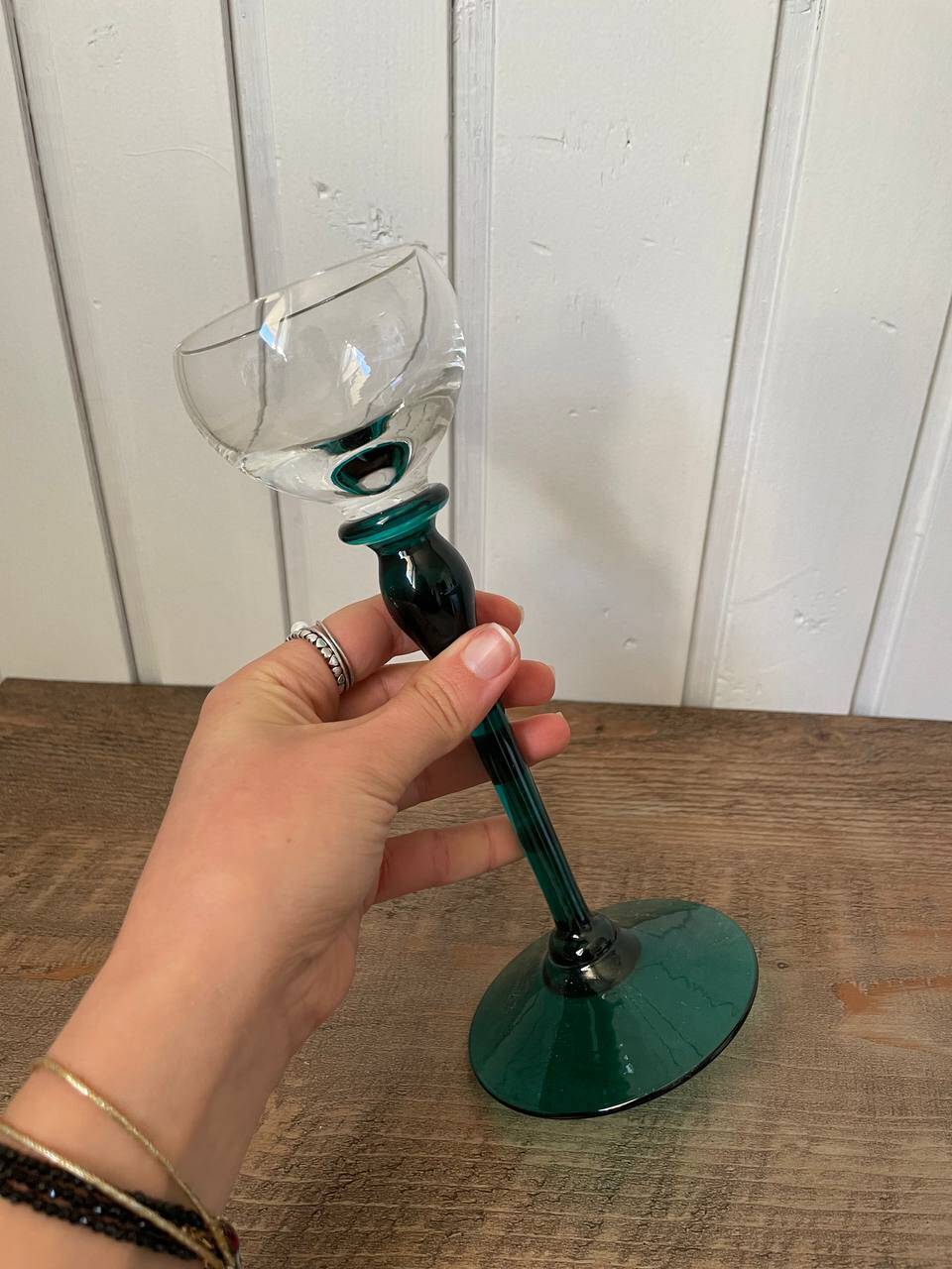 crystal wine glass on green stem