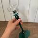 crystal wine glass on green stem