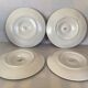 Four old Longchamps oyster plates