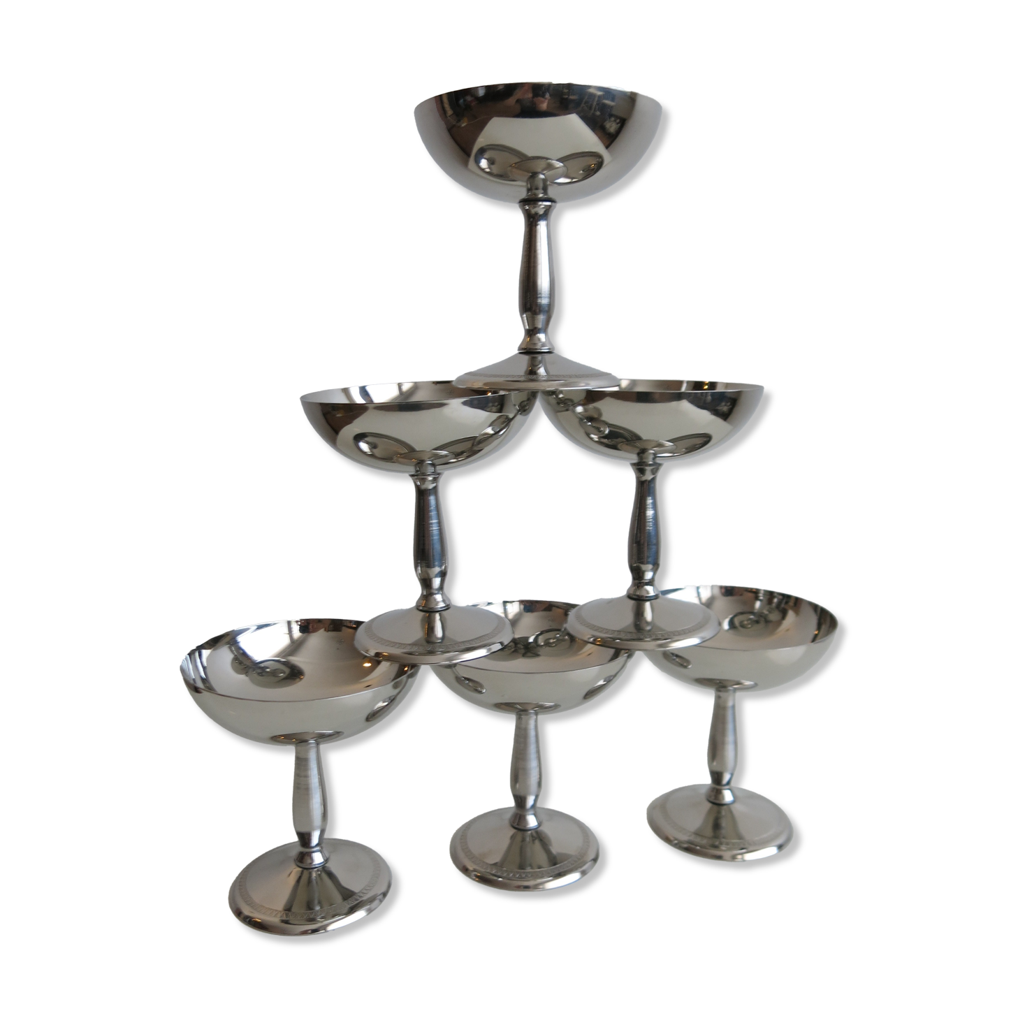 Set of six stainless steel standing cups