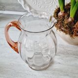 Blown glass pitcher with pink handle