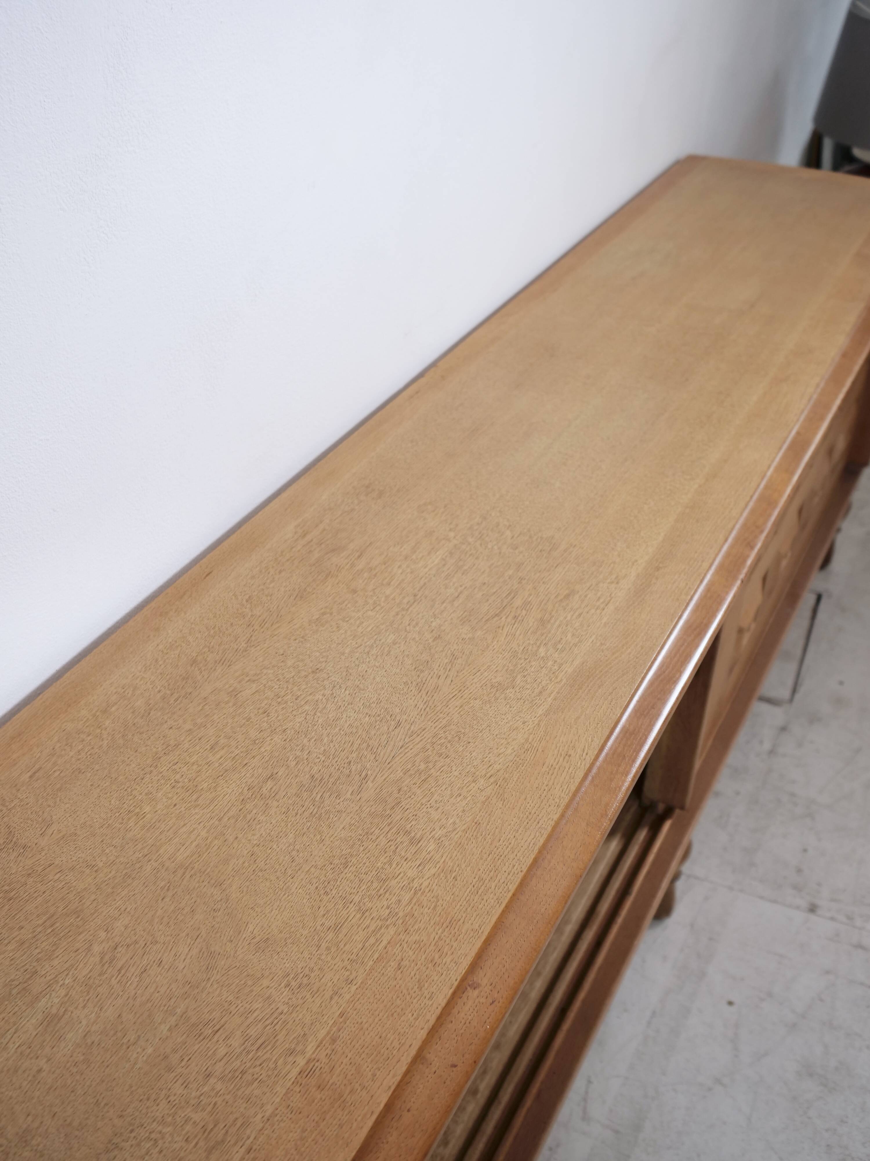 Guillerme and Chambron oak sideboard in light wood in a brutalist style.
